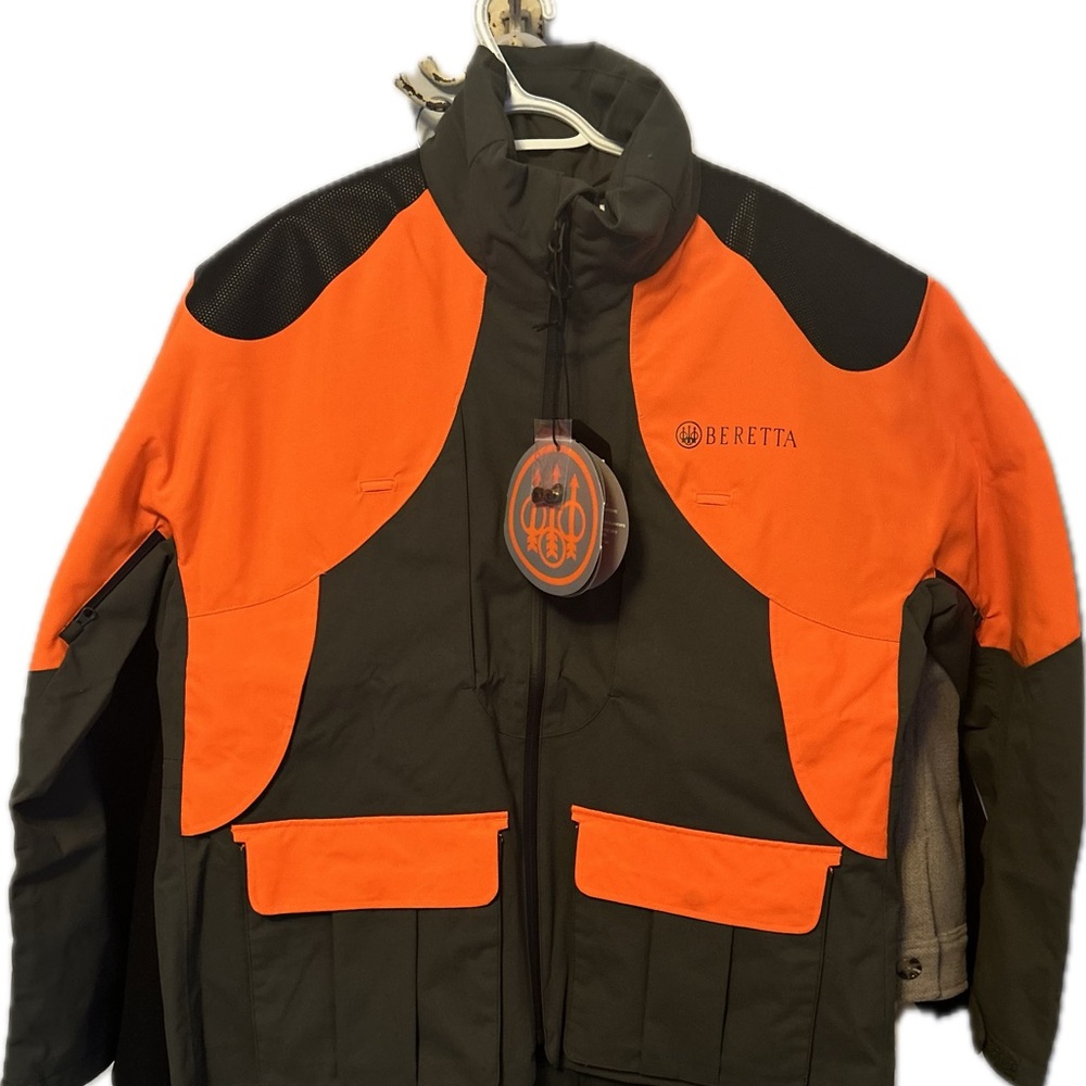 Beretta orange jacket, NWT, 2XL (snug fit), 4 inner pockets, hideable hood.